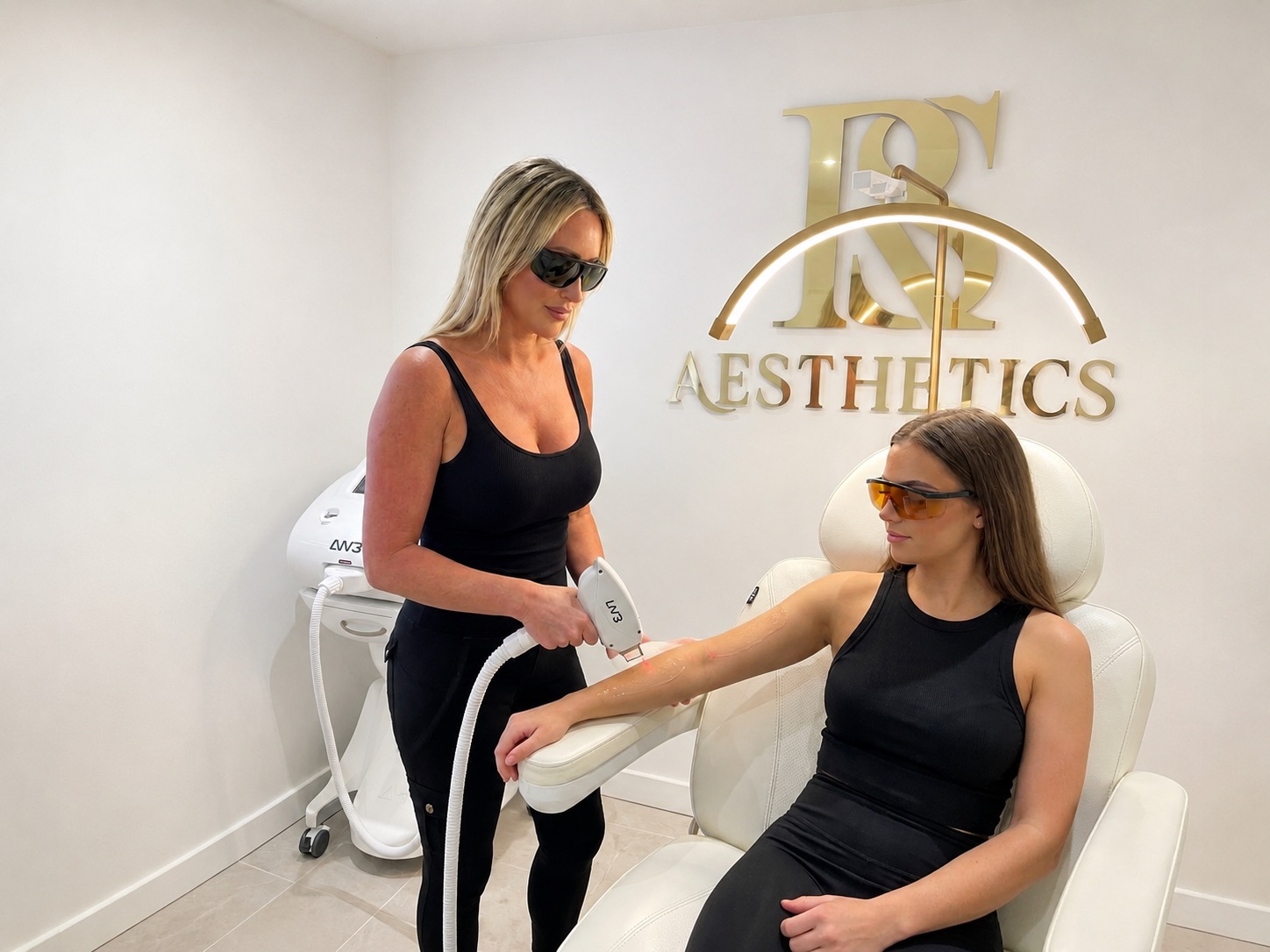 Rebecca performing a laser hair removal treatment